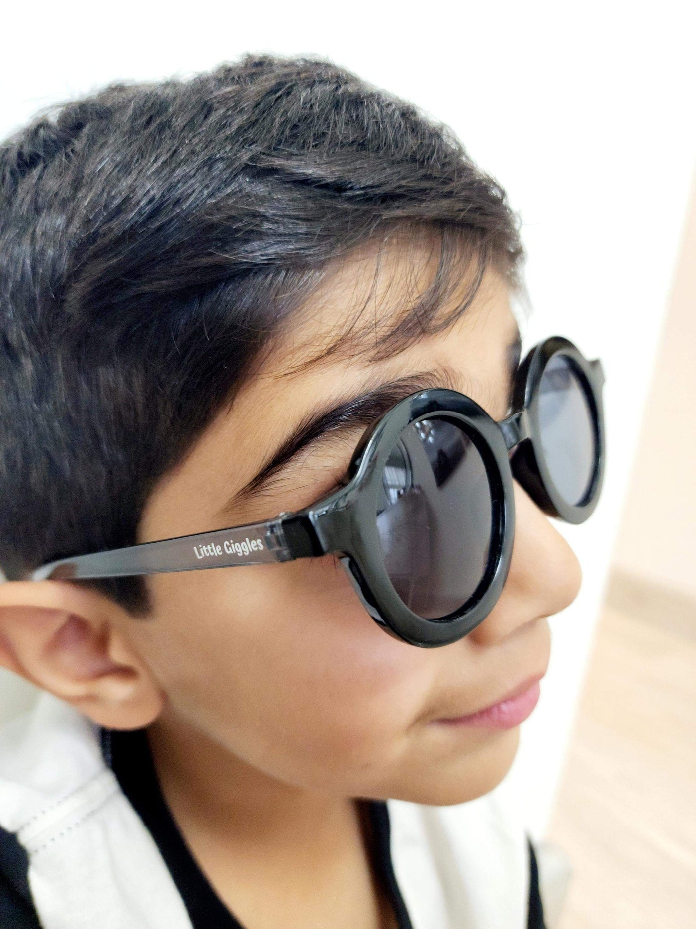 Kid Wearing Black Sunglasses