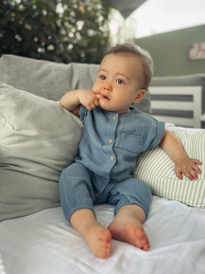 Baby Wearing Navy Austen Romper