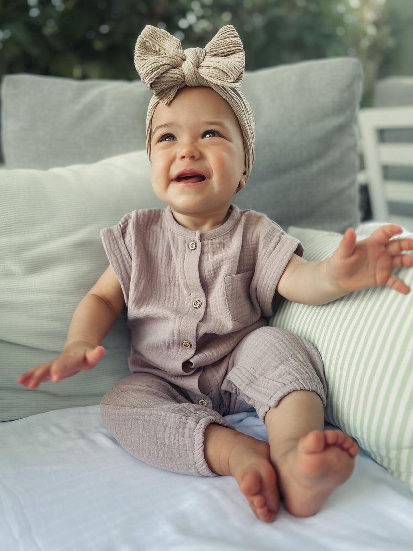 Baby Wearing Purple Austen Romper