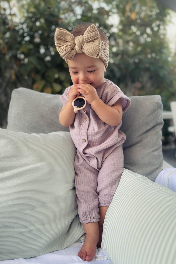 Baby Girl Wearing Purple Austen Romper